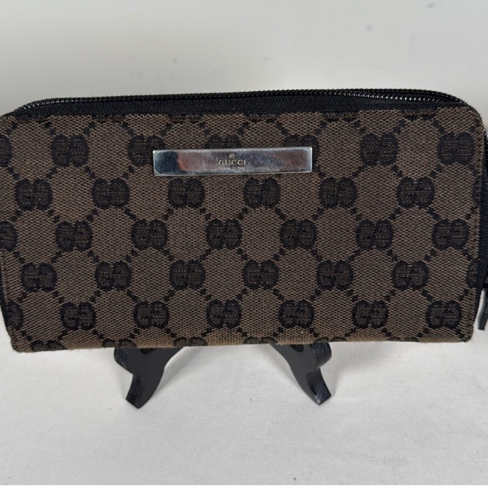 Gucci Brown GG Canvas Zip-Around Wallet with Silver Plaque